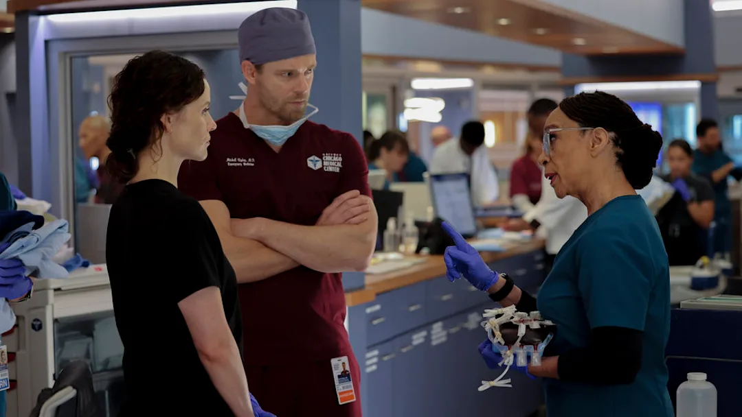 CHICAGO MED -- "Sink or Swim" Episode 1001 -- Pictured: (l-r) Sarah Ramos as Dr. Caitlin Lenox, Luke Mitchell as Dr. Mitch Ripley, S. Epatha Merkerson as Sharon Goodwin -- (Photo by: George Burns Jr/NBC)